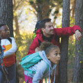 Children exploring the nature with supervisor